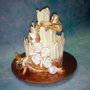 Chocolate Fence Wedding Cake with Gold Touched Roses